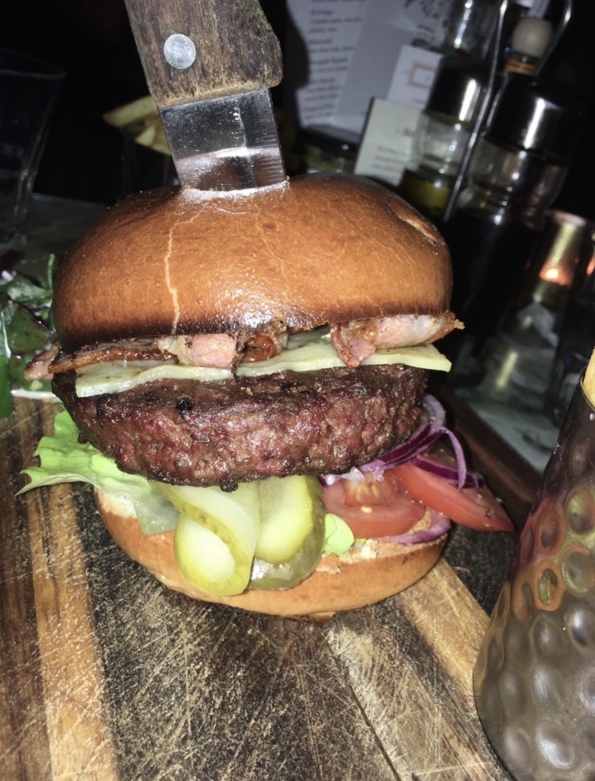 A heavily loaded burger illustrating the boom and rising cost of premium burgers.