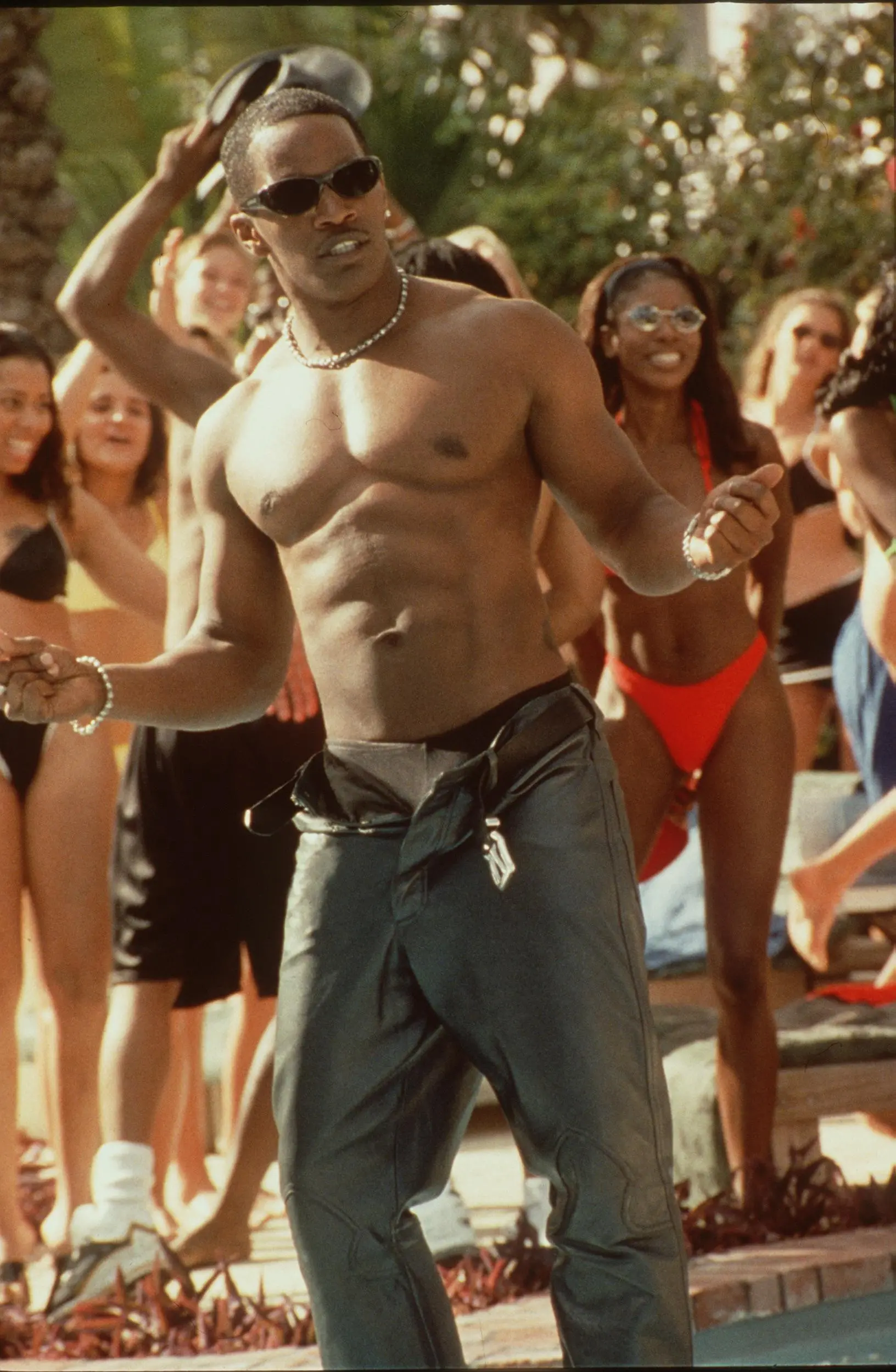 Jamie Foxx as Willie Beamen wearing the Miami Sharks number 13 uniform