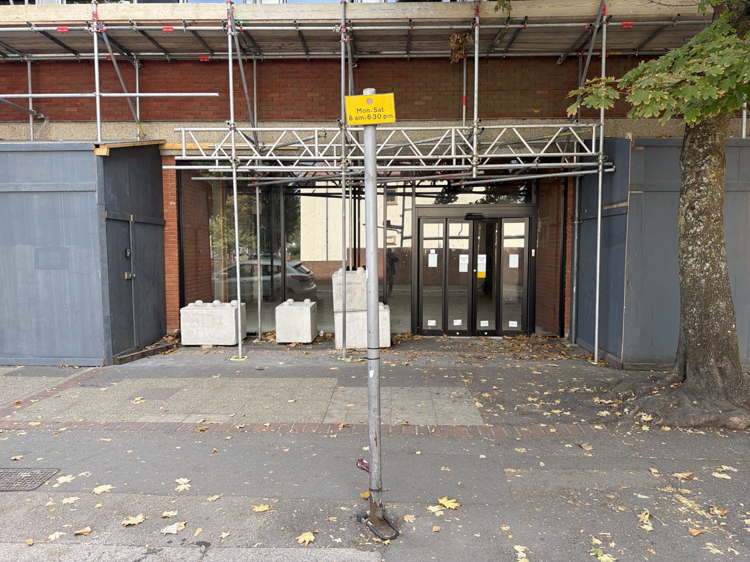 The boarded and scaffolded former Fitness4Less entrance on Blagdon Road in New Malden