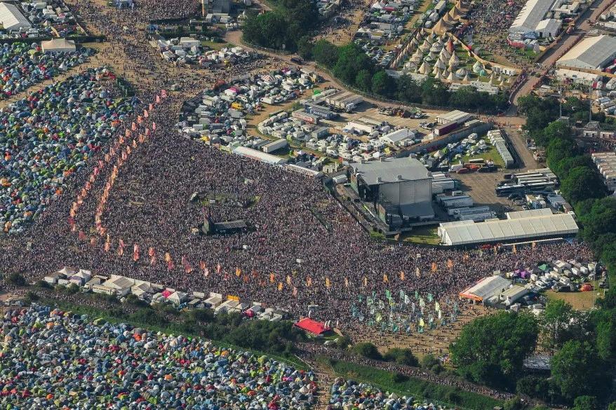 Aerial view of the Pyramid Stage and crowd at Glastonbury Festival