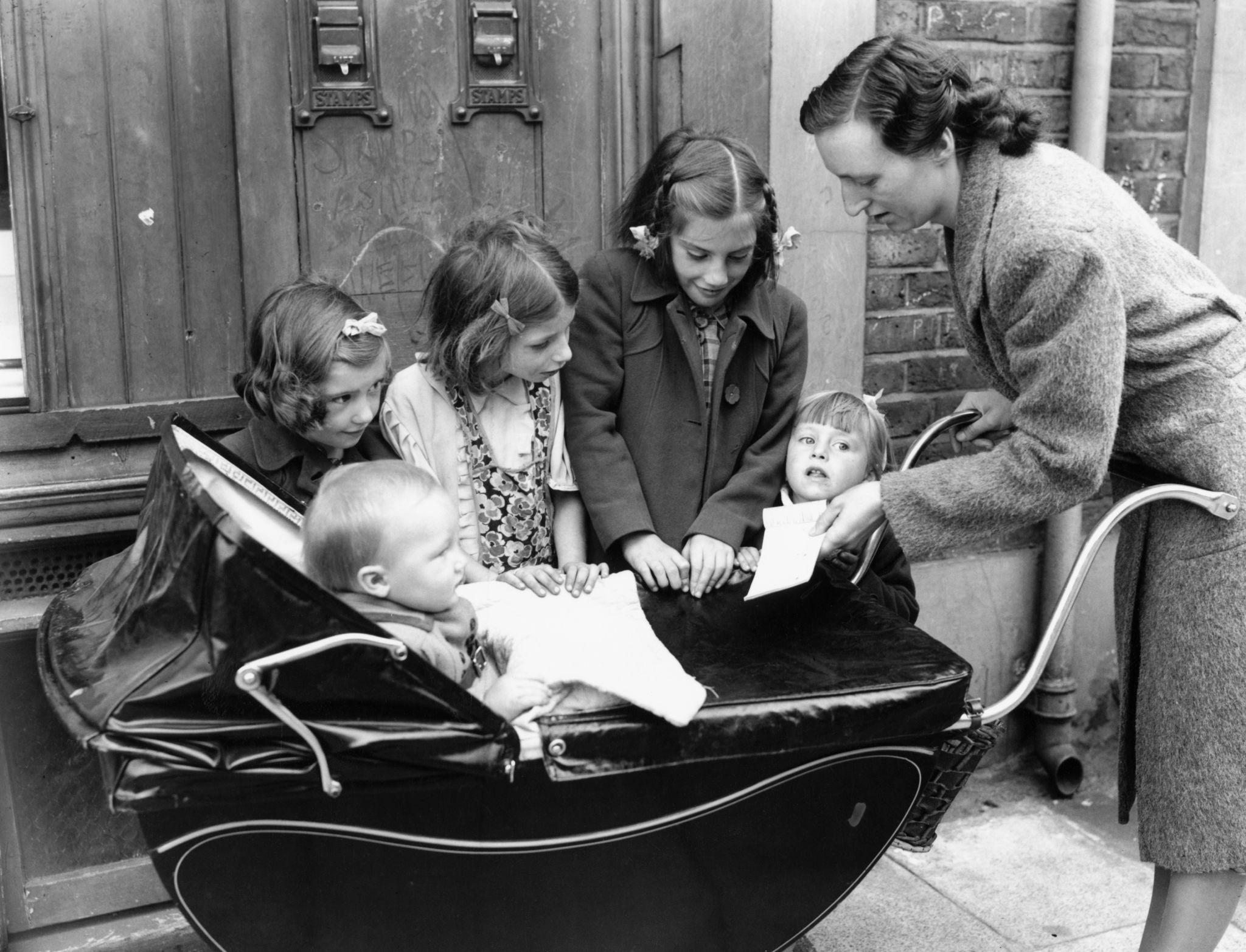 Mother and five children collecting Family Allowance at a Stratford post office in 1946